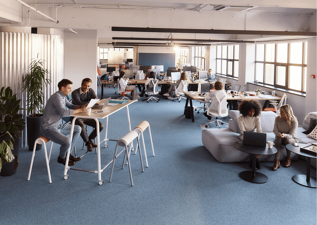 Open office space with people working collaboratively.