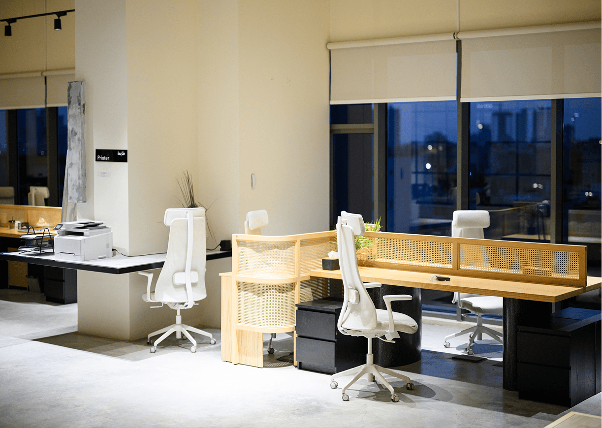 Modern office with desks and chairs.